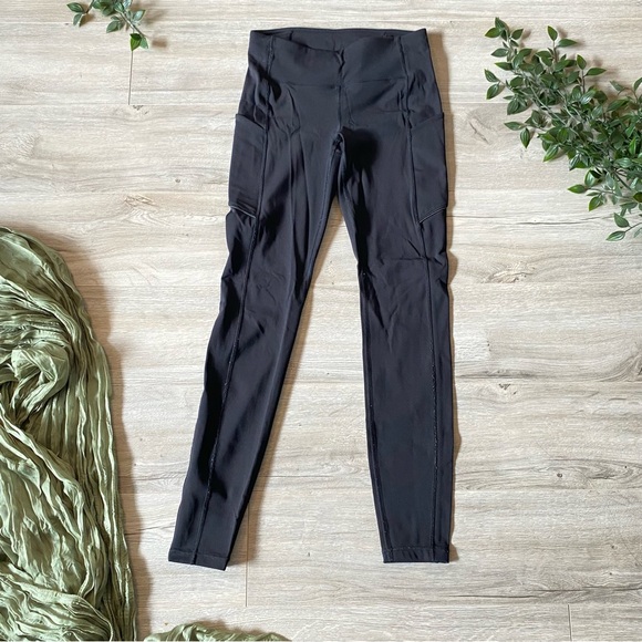 Black leggings with pockets from Lululemon - size 4 - Picture 1 of 9